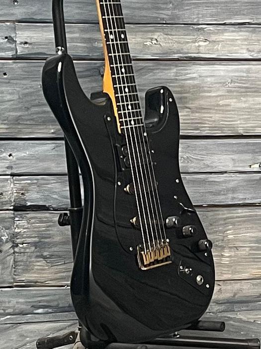 Impact of Music Genres on Guitar Designs