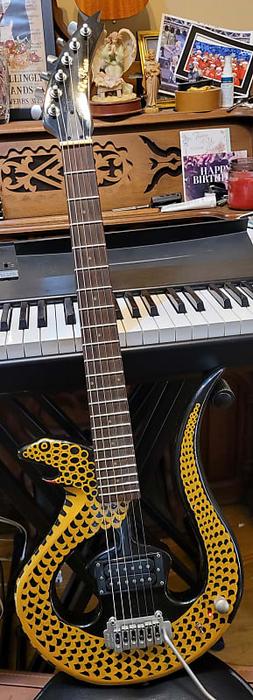 Price and Where to Purchase De Rosa Serpent Electric Guitar