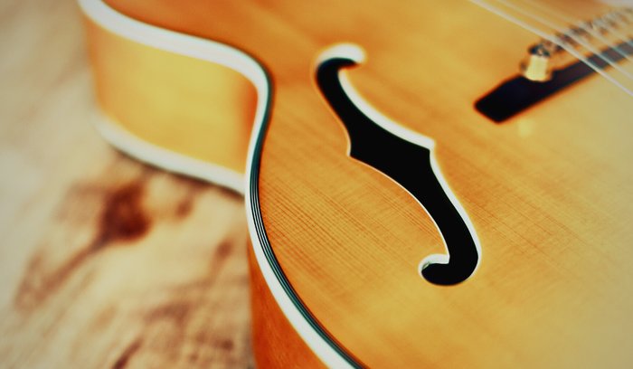 18 Acoustic Guitars With F-Holes - Tone Changer?