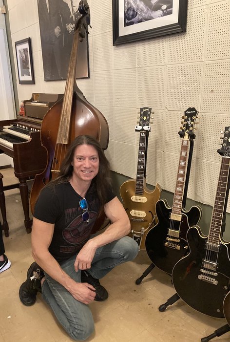 Daniel Peters (@shredabilly) performing in a solo setting, which resonates with the theme of solo performance and smaller lineups.